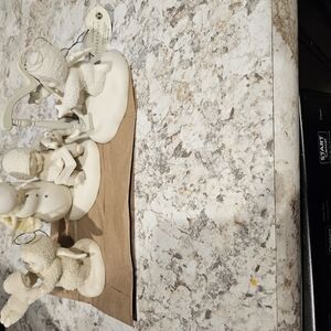 Whimsical Snowman and Sheep Figurine Set